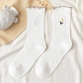 White ribbed mid-calf socks featuring light purple lettuce edge and daisy embroidery - One Size / White