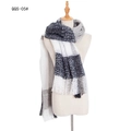 Women's plaid tassel scarf in black white and gray grid pattern on a display stand - Black Grey Plaid