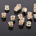 Golden 18k metal and clear silicone disc earring backs for secure DIY jewelry crafting - KC Gold Ring Hamburger Earring Backs
