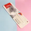 Silver metallic number 4 birthday candle with white holder in retail packaging - Number 4 / Silver