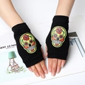 Black knitted fingerless gloves with colorful embroidered sugar skulls on white magazine - One Size / Yellow Embroidery