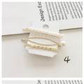 Detailed view of three gold metal pearl hair clips set on a stylish magazine background - Style 4# (3-Piece Gold Faux Pearl Side Clip Set)
