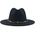 Close-up of black wool fedora featuring leopard print band and golden star emblem - Black