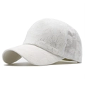 Close-up of intricate flower embroidery and lace mesh detail on white baseball cap - Adjustable / White