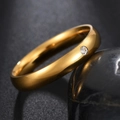 Minimalist 18K gold stainless steel ring with a single sparkling zircon stone inlay - US 10 / Gold