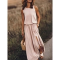 Close-up of pale pink sleeveless summer dress featuring side slit and soft knit fabric - S / Khaki