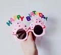 Pink cupcake-shaped birthday party glasses with colorful Happy Birthday letters - Pink Birthday Cake