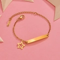Detail of gold stainless steel bar bracelet with hollow star charm and engravable plate - Gold Five-pointed Star