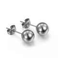 Polished silver stainless steel ball stud earrings with butterfly backs on white background - 8mm / Steel