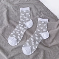 White sheer crew socks featuring all-over heart patterns and reinforced cotton soles - One Size / White Heart