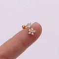 Macro detail of a small flower dangle earring with zircon stones and a screw ball back - Small Floral Pendant (Gold 6#)