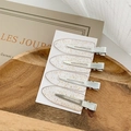 Set of 4 transparent gold glitter acrylic seamless hair clips on a wooden tray - BM1041 Transparent Gold Glitter 4pcs Set