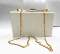 Chic white acrylic box clutch bag with gold metal trim and detachable chain strap - White