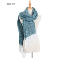 Blue-green and white knit scarf with fringe displayed on a mannequin for fall winter - Mottled Dark Green