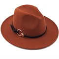 Rust red fedora wool hat featuring a black leather band and golden metal ring detail - Caramel color
