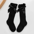 Kids breathable mesh socks in black with large satin bows and vertical striped texture - Black