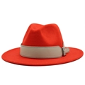 Detailed view of the red wool fedora featuring a beige leather belt and silver buckle - Orange Red
