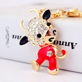 Golden crystal zodiac ox keychain with red enamel finish and sparkling rhinestone floral detail - Red Ox