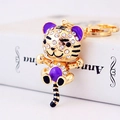 Charming purple tiger keychain with gold plating and sparkling crystal accents - Purple Tiger