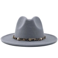 Close-up of grey wool fedora hat featuring leopard print band with gold star accents - Gray