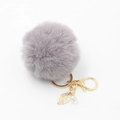 Portachiavi con pompon di pelliccia viola chiaro, foglia dorata e perla lucida - Grigio chiaro