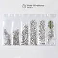 Vista plana de pedrería de cristal blanco en tallas SS4-SS16 para diseños de uñas DIY - SS4-SS16(6 Rejillas) / Diamantes de Imitación Blancos
