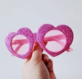 Pink glitter heart-shaped party sunglasses with tinted lenses for festival celebrations - Glitter Heart