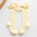 Mesh baby socks in beige with breathable hollow knit and large satin bow detail - Yellow