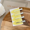 Set of four yellow glitter seamless hair clips with metal duckbill design on display card - BM1017 Yellow Gold Glitter 4pcs Set