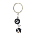 Bernese Mountain Dog metal keychain with paw print pendant on white background - Bernese Mountain Dog