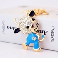 Blue enamel bull keychain with crystal rhinestones and golden alloy finish - Blue Ox