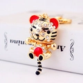 Sparkling crystal tiger keychain with gold alloy finish and white rhinestones - Red Tiger