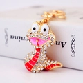 Golden zodiac snake keychain pendant with white crystals and red enamel finish - Red Snake