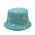 Close-up of blue bucket hat featuring realistic banana patterns and canvas fabric texture - M / Blue Banana