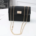 Black litchi-grain PU crossbody phone bag with gold metal chain strap and turn-lock closure - Black