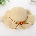 Cappello da sole in paglia per bambini con tesa ondulata e fiori colorati - Cappello / Beige