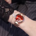 Detail of rose gold mesh watch and swan bracelet set with red rhinestone dial - Red + Bracelet