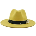 Close-up of a yellow wool fedora hat featuring a pearl floral accent and black ribbon band - Yellow