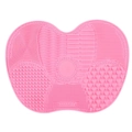 Pink silicone makeup brush cleaning mat with suction cups and various textures - Pink