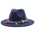 Detail of navy blue felt fedora featuring bohemian band with tassels and peace charm - Navy Blue