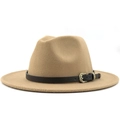 Close-up of wool fedora hat with black leather band and antique metal leaf buckle - Camel