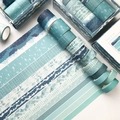 Set van 12 washi-tapes in blauw en cyaan met berglandschap en rasterpatronen - Blauwe Traject