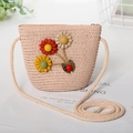 Detailed view of child straw bag with colorful floral and ladybug accents - Bag / Pink
