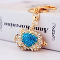 Cute crystal zodiac pig keychain with sky blue rhinestones and gold lobster clasp - Blue Pig