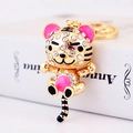 Sparkling crystal tiger keychain pendant with pink enamel and gold-plated finish - Pink Tiger