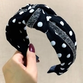 Close-up of black polka dot headband with knot design and sparkling rhinestone detail - Black Polka Dot Rhinestone
