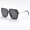 Chic black oversized square sunglasses with gold flower accents and silver hollow temples - Glossy Black Frame Grey Lens