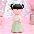 Chibi Dunhuang fairy figurine in beige top and green skirt holding a scroll - Large Reading Figurine