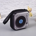 Square tinplate coin purse featuring a vintage record player design with black wrist strap - Gramophone