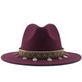 Detail of burgundy wool fedora hat featuring ethnic ribbon and silver coin charms - M (56-58cm) / Burgundy